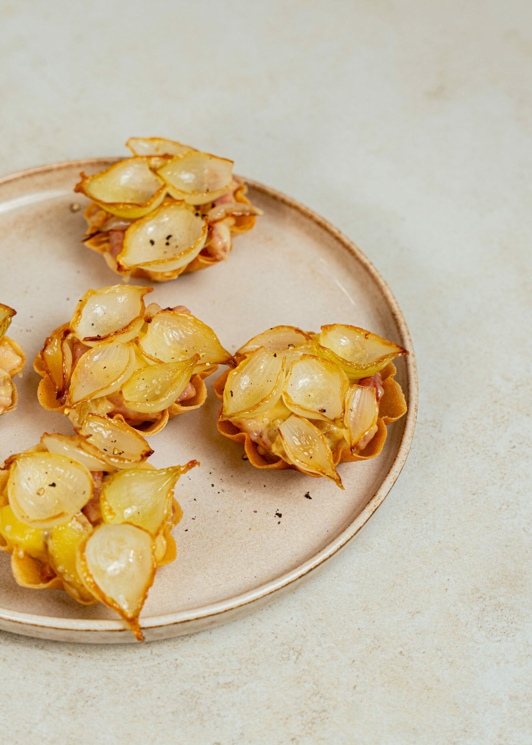Tartelette d’oignon saucier façon raclette